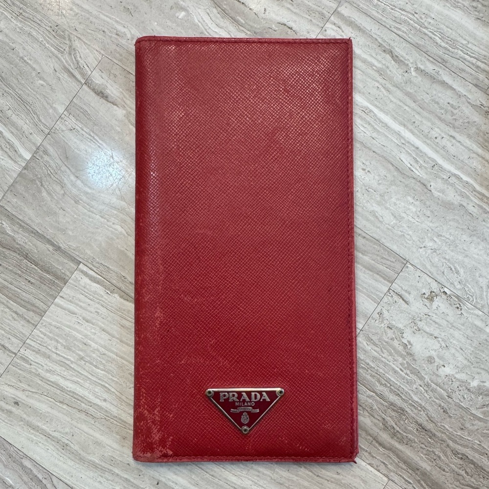 Prada check book holder
Wallet